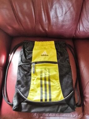 Adidas Black and Yellow Drawstring Backpack with Front Zip Pocket